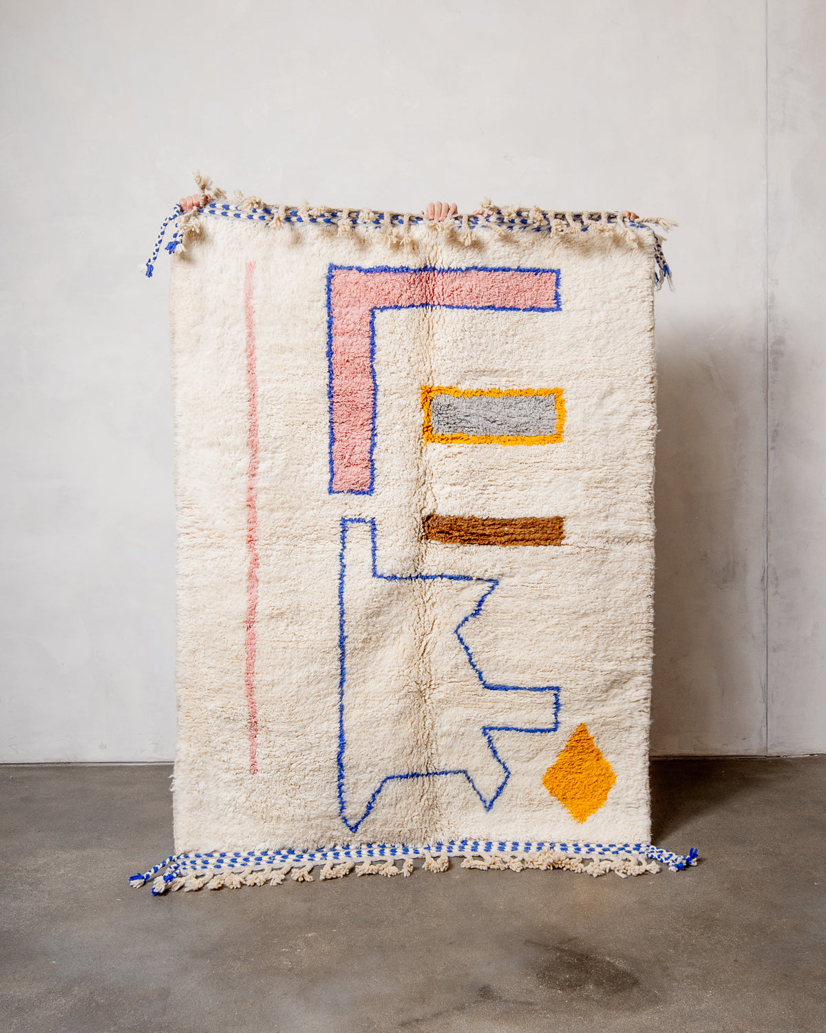 Modern, designer, handcrafted Berber rug from Morocco. Beniourain carpet with beautiful colours and patterns and fluffy wool texture.